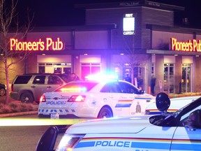 At least two men have been arrested after a masked man barged into the Pioneer's Pub in Richmond Thursday night and allegedly assaulted a patron with the back end of a shot gun. Vancouver police arrested the men at a White Spot in Vancouver.