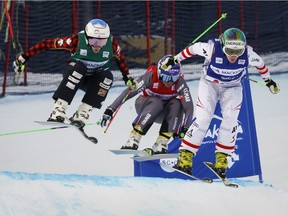 Austria's Andrea Limbacher, right, France's Marielle Berger Sabbatel, centre, and Canada's Georgia Simmerling ski during the women's semifinal at the World Cup ski cross event at Nakiska Ski resort in Kananaskis, Alta., Saturday, Jan. 20, 2018.