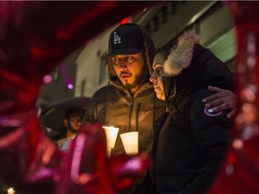 Friends and family gather for a candlelight memorial for Kalwinder Thind.