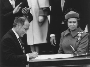 Constitution signing  Prime Minister Elliott Trudeau and Queen Elizabeth II -  Canadian constitution document after patriation, Ottawa, 17 April, 1982.