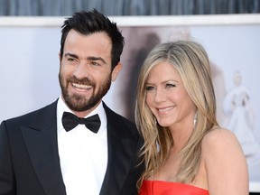 Actors Justin Theroux and Jennifer Aniston arrive at the Oscars at Hollywood & Highland Center on February 24, 2013 in Hollywood, California.
