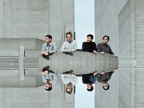 Enter Shikari is an English band fronted by Rou Reynolds, second from left. Enter Shikari has released The Spark.