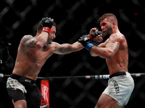 Jeremy Stephens (right) takes on Frankie Edgar in their featherweight bout at UFC 205 at Madison Square Garden in New York in November 2016.