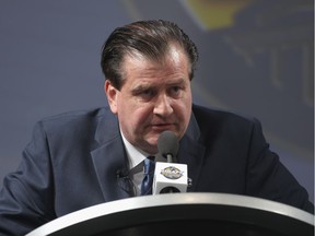 General manager Jim Benning of the Vancouver Canucks speaks at the podium during round one of the 2016 NHL Draft at First Niagara Center on June 24, 2016 in Buffalo, New York.