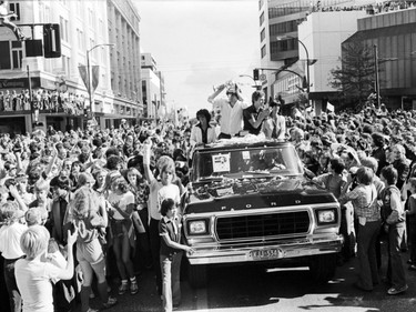 Vancouver celebrates with a victory parade down Granville Street for the NASL champion Vancouver Whitecaps, with goalie Phil Parkes (left) and captain John Craven (right) with the trophy. September 9, 1979.