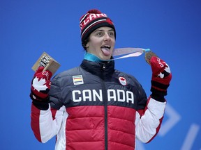 Olympic bronze medallist Mark McMorris of Canada poses on the podium during the medal ceremony for the men's snowboard slopestyle competition at the PyeongChang 2018 Winter Olympic Games in South Korea on Feb. 11, 2018. (Photo: Andreas Rentz, Getty Images)