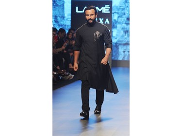 Indian Bollywood actor Saif Ali Khan showcases a creation by designer Shantanu & Nikhil at the Lakmé Fashion Week (LFW) Summer Resort 2018 in Mumbai on February 3, 2018.