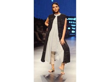 Indian Bollywood actress Swara Bhaskar showcases a creation by designer Crow at the Lakmé Fashion Week (LFW) Summer Resort 2018 in Mumbai on February 4, 2018.