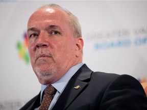 British Columbia Premier John Horgan participates in a question and answer session after giving a post-budget address to the Greater Vancouver Board of Trade in Vancouver, B.C., on Friday February 23, 2018.