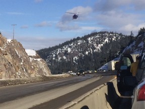 An air ambulance attends the scene of the crash on the Coquihalla Highway.