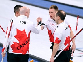 In this Feb. 15 file photo, Canada's men's curling team celebrates a win over Norway at the Pyeongchang Olympics.
