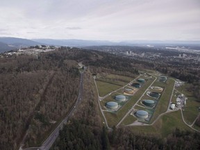 Kinder Morgan Trans Mountain Expansion Project's oil storage tank farm, at right with green tanks, is seen in Burnaby, B.C., on Friday, Nov. 25, 2016.