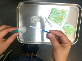 A test strips used to check for presence of illicit fentanly in such drugs as heroin, crystal meth and cocaine in this undated handout images provided by Vancouver Coastal Health.
