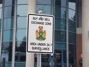 ABBOTSFORD, B.C.: FEBRUARY 27, 2018 – The APD has created a designated buy-and-sell exchange zone in front of their detachment where buyers and sellers can park, meet and make their exchanges – all while under video surveillance and within reach of police if a sale goes sideways. [PNG Merlin Archive]