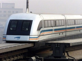 FILES -  A file picture taken on 31 December 2002 shows Shanghai's commericial magnetic levitation train built and designed by German engineering giants Siemens and ThyssenKrupp.