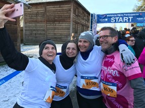 This fun foursome from Re/Max Little Oak Realty in Fort Langley bounced around trying to stay warm Sunday morning while snapping pre-race selfies in the starting gate at the 13th Fort Langley Historic Half, 10K and 5K event. An overnight "weather event" made life interesting Sunday morning in the Fraser Valley.