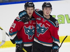 Kelowna Rockets Conner Bruggen-Cate and Kole Lind celebrate a goal against the Vancouver Giants earlier this season. The Rockets face the Giants in Kelowna on Wednesday.