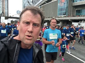Sun Run blogger Glen Schaefer, left, gets to the 2017 finish line by B.C. Place Stadium in just under 66 minutes. This year he wants to break the one-hour mark.