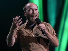 American comedian Kyle Kinane performs during a Just for Laughs gala hosted by American comedy star Sarah Silverman at the Salle Wilfrid Pelletier of Place des Arts in Montreal Saturday, July 27, 2013.