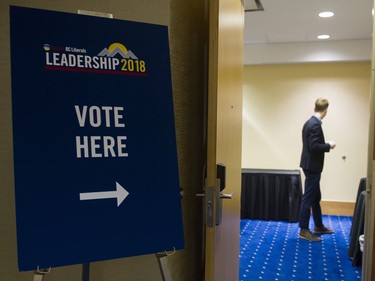 BC Liberal party staffers man a polling station at the Wall centre for the BC Liberal leadership convention, Vancouver, February 03 2018.