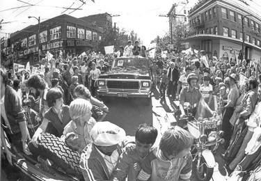 1979:  An estimated 100,000 fans cram into Robson Square and line downtown streets as the Vancouver Whitecaps return after winning the NASL Soccer Bowl. On a Sunday afternoon, a pick-up truck carries team members and the trophy through the streets, after the Whitecaps defeat the Tampa Bay Rowdies 2-1 at Giants Stadium in New Jersey.
