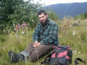 John Lambert Bjornstrom, the Bushman of the Shuswap, near his main camp near the lake.  (Photo: Dale Steeves/Special to The Vancouver Sun) [PNG Merlin Archive]