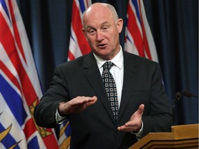 Minister of Public Safety and Solicitor General Mike Farnworth speaks to the media about how non-medical cannabis will be regulated in the province during news conference in Victoria on Monday.