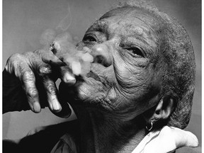 Feb 15, 1960: Matilda Boynton smoking a cigar at age 102.