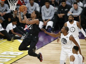 DeMar DeRozan of the Toronto Raptors goes hard to the basket for an easy layup on behalf of Team Stephen during Sunday's NBA All-Star Classic in Los Angeles. Despite 21 points by DeRozan, the team labelled Team LeBron pulled out an exciting 148-145 victory.