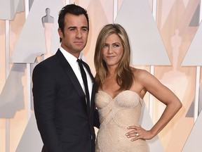 FILE - In this Feb. 22, 2015 file photo, Justin Theroux, left, and Jennifer Aniston arrive at the Oscars in Los Angeles. The couple announced Thursday, Feb. 15, 2018, that they have separated.