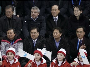 FILE - In this Feb. 10, 2018 file photo, Kim Yo Jong, sister of North Korean leader Kim Jong Un, top right, and North Korea's nominal head of state Kim Yong Nam, second right, Thomas Bach, President of the International Olympic Committee, and South Korean President Moon Jae-in, top left, watch the preliminary round of the women's hockey game between Switzerland and the combined Koreas at the 2018 Winter Olympics in Gangneung, South Korea.