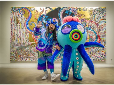 Artist Takashi Murakami poses for the photographer