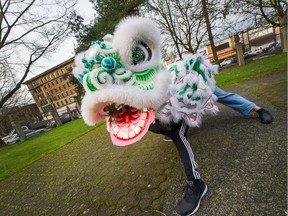 Lion Dancers Michael Tan and his master Peter Wong in Vancouver, BC,  February 15, 2018.