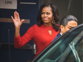 Michelle Obama leaves the Queen Elizabeth Theatre on Thursday after speaking in Vancouver.