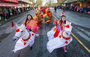 Thousands of people turned out for the Chinese Lunar New Year Parade, Year of the Dog, in Chinatown, Vancouver, BC,  February 18, 2018.
