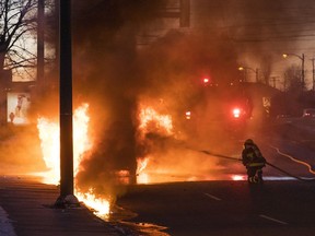 A plumbing van on fire near the corner of Renfrew and Broadway on Thursday evening. Crews quickly extinguished the blaze right outside Postmedia's offices.