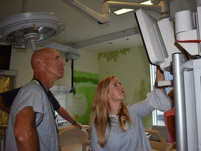 FILE PHOTO - Dr. Peter Skippen and Kathleen Sullivan, a Pediatric Intensive Care Unit nurse and implementation specialist with the redevelopment team checks out equipment on the first Day in the Life training exercise at the new Teck Acute Care Centre.