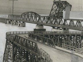 Leonard Frank photo of the first Second Narrows Bridge, circa 1925 to 1930. The bridge was opened on Nov. 7, 1925 and was closed and redesigned after a ship hit it in 1930. This print has been heavily doctored to make it print better in the Province, which ran it.