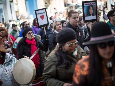 People listen to speakers during a rally for Tina Fontaine in Vancouver, B.C., on Saturday February 24, 2018. A man accused of killing a 15-year-old Indigenous girl and dumping her body in Winnipeg's Red River was found not guilty of second-degree murder this week.Tina Fontaine's remains were discovered eight days after she was reported missing in August 2014.