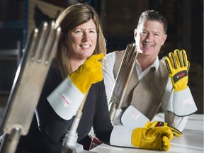 Michele Moore and Marty Moore, descendants of the original owners of Watson gloves at their plant in  Burnaby.