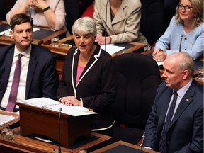 From left, Attorney General David Eby, Finance Minister Carole James and Premier John Horgan in the legislature, where the NDP has continued its shift from Opposition to government by pragmatism.