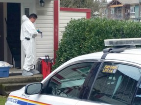 Investigators at a home in Port Alberni on Wednesday, March 14, 2018, following the death of a six-year-old child.