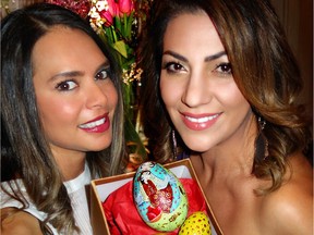 Mana Jalalian helped arrange and Mona Malekian painted eggs for a traditional Persian New Year Haft Sin display at the Neekoo Philanthropic Society's scholarship-funding soirée.