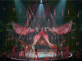 Drummers are suspended from the ceiling during the Hall of Equals segment of Volta by Cirque du Soleil.