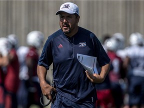 Former Montreal Alouettes coach Anthony Calvillo watches team practice at the Olympic Stadium in Montreal on Sept. 14, 2017.