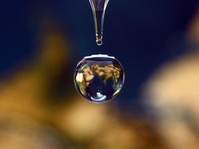 A picture taken on March 20, 2013 in Marseille, France, shows a drop of water that reflected a map of the Earth. World Water Day is held annually on March 22 to draw attention to the importance of freshwater and advocating for the sustainable management of freshwater resources.