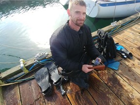 While crabbing in White Rock on March 4, diver Mike Bertness found a purse containing several hundred dollars and prepaid credit cards. When he returned it, he learned it had been lost eight months ago.