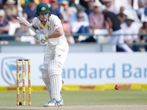 Australian batsman Cameron Bancroft gets ready to play a shot during the fourth day of the third Test cricket match between South Africa and Australia at Newlands cricket ground on March 25, 2018 in Cape Town.