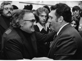 Former human resources minister Norman Levi, left, and Premier Dave Barrett on Dec. 15, 1975.