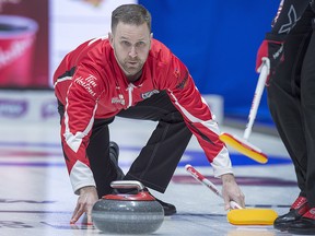 Team Canada skip Brad Gushue releases a rock on the way to his record-setting victory over the Northwest Territories at the Tim Hortons Brier at the Brandt Centre in Regina on Monday, March 5, 2018. (THE CANADIAN PRESS/Andrew Vaughan)